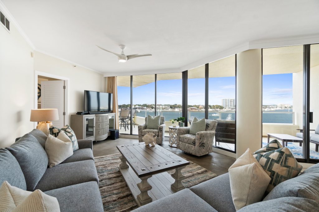 Paradise Point condo's living room panoramic view of Destin Habor
