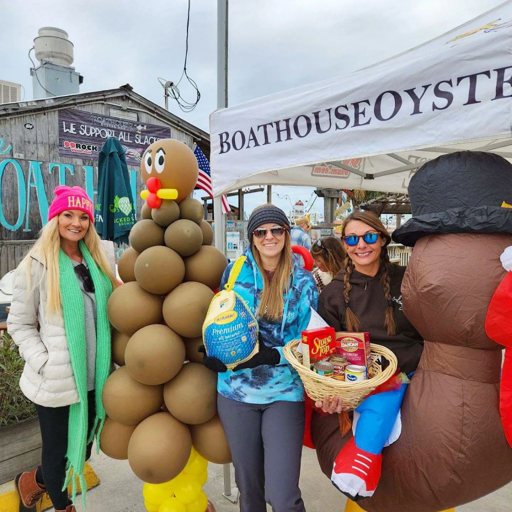 Breathe Easy Rentals at Thanksgiving charity event on the Destin Harbor